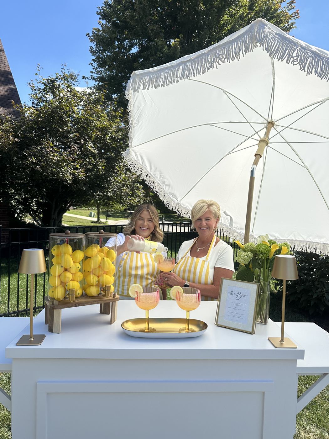 The signature styled bar with fringed umbrella